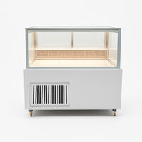 Low-profile cake and fresh food display fridge by Fridges World with open interior and LED lighting, ideal for cafés and delis