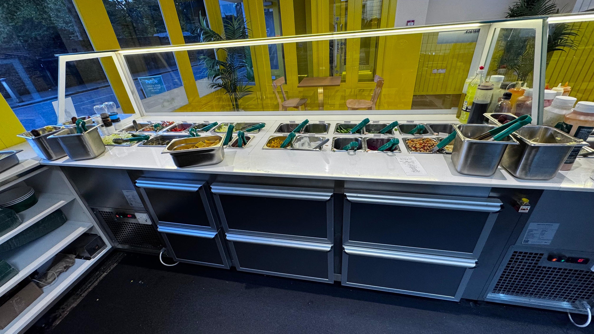 Food preparation area with various ingredients and equipment in a kitchen setting.