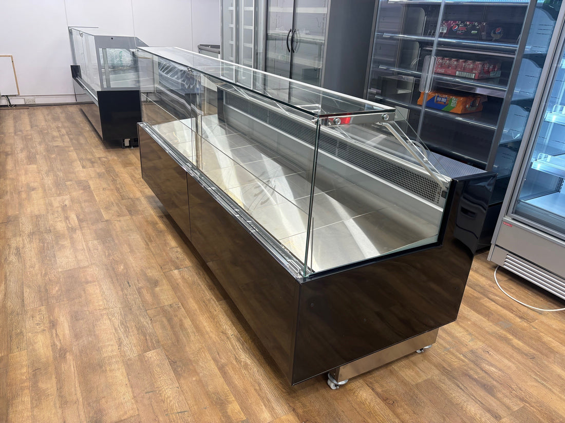 Fridges World Arneg serve over counter fridge with straight glass front, black finish, and LED lighting – ideal for meat and deli display